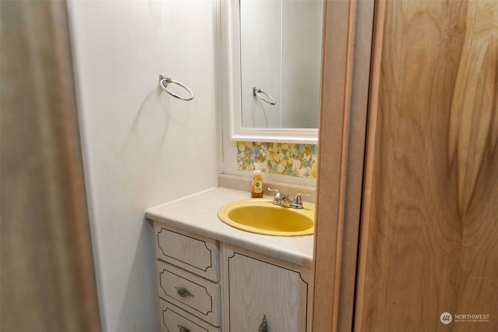 17210 Entiat River Road Entiat, WA 98822 - Photo 28 of 37 a bathroom with a granite countertop sink and a mirror