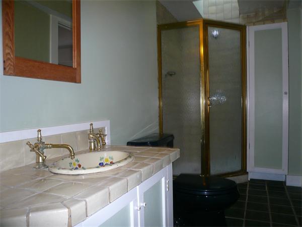 563 Montague Road Amherst, MA 01002 - Photo 3 of 15 a bathroom with a sink and a mirror