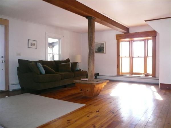 563 Montague Road Amherst, MA 01002 - Photo 8 of 15 a living room with furniture and a large window