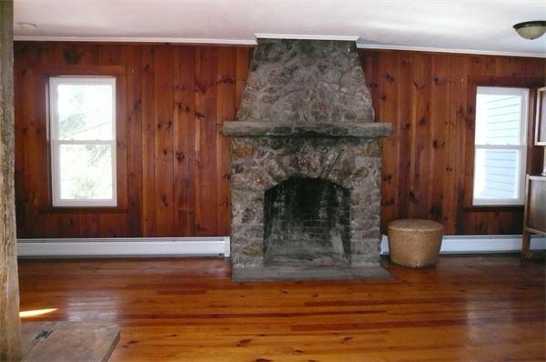 563 Montague Road Amherst, MA 01002 - Photo 9 of 15 a living room with furniture and a fireplace