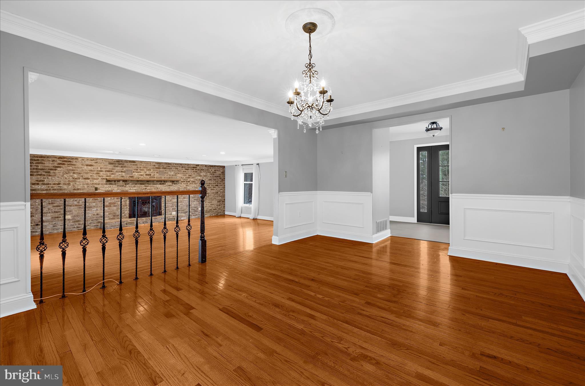 3300 Paper Mill Road Phoenix, MD 21131 - Photo 14 of 91 a view of an empty room with wooden floor and a fireplace
