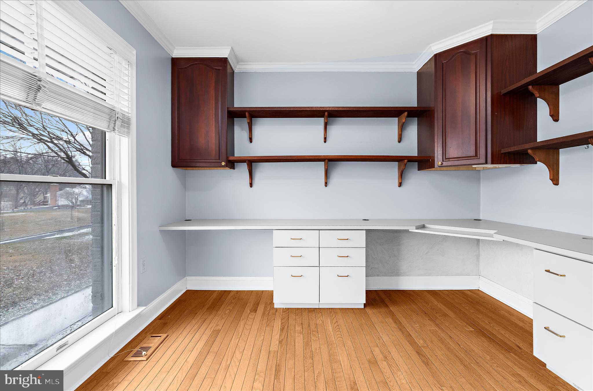 3300 Paper Mill Road Phoenix, MD 21131 - Photo 19 of 91 a room with cabinets and wooden floor