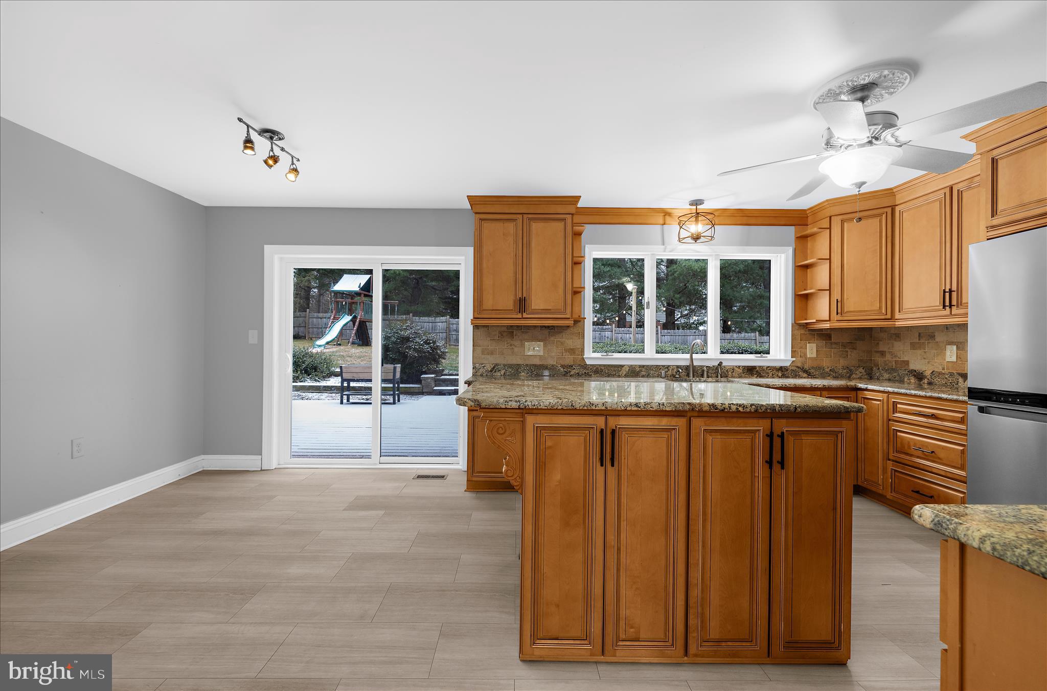 3300 Paper Mill Road Phoenix, MD 21131 - Photo 21 of 91 a kitchen with granite countertop a sink cabinets and window
