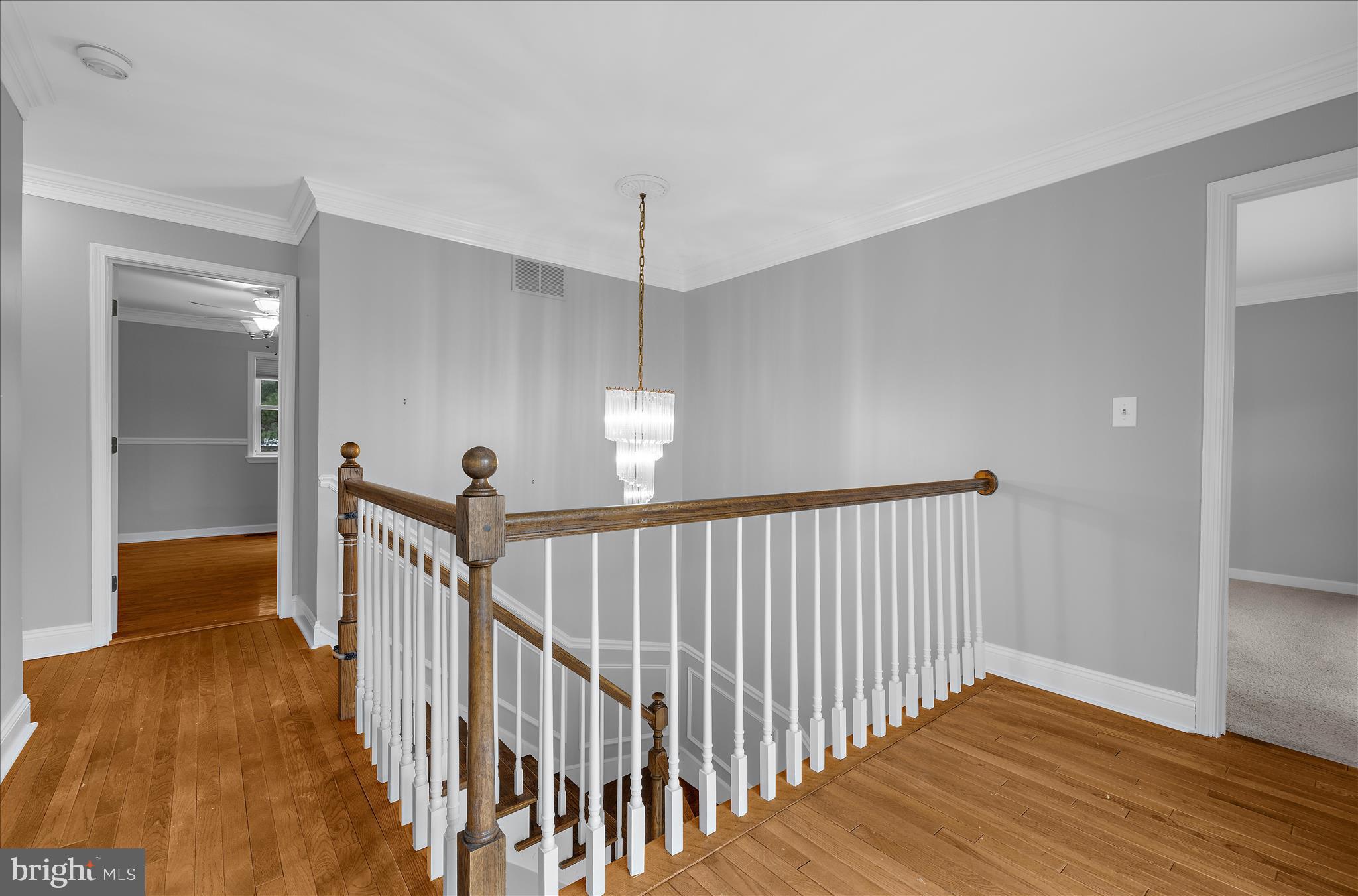 3300 Paper Mill Road Phoenix, MD 21131 - Photo 40 of 91 a view of a hallway with wooden floor and stairs