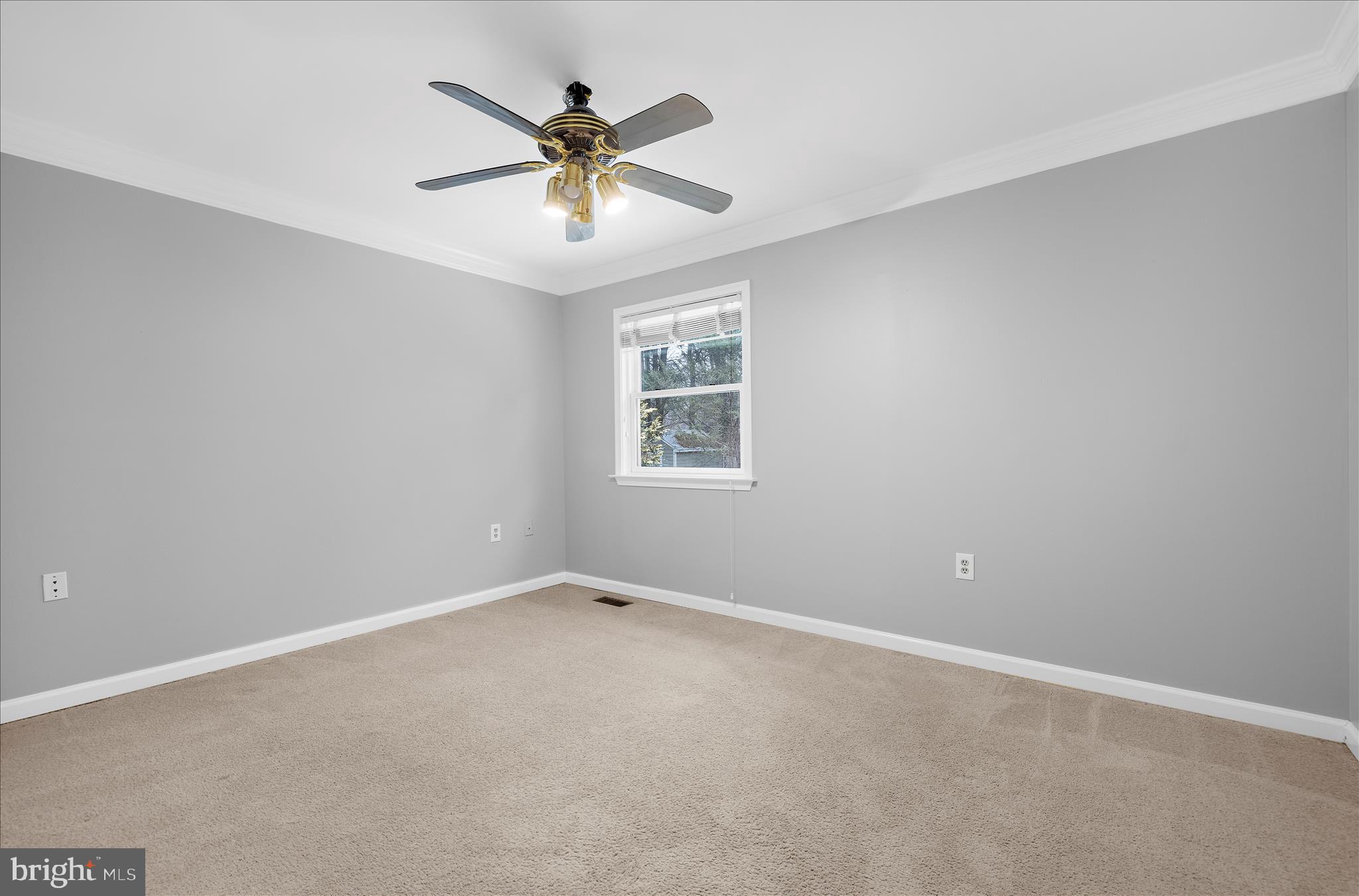 3300 Paper Mill Road Phoenix, MD 21131 - Photo 45 of 91 an empty room with a window and a fan