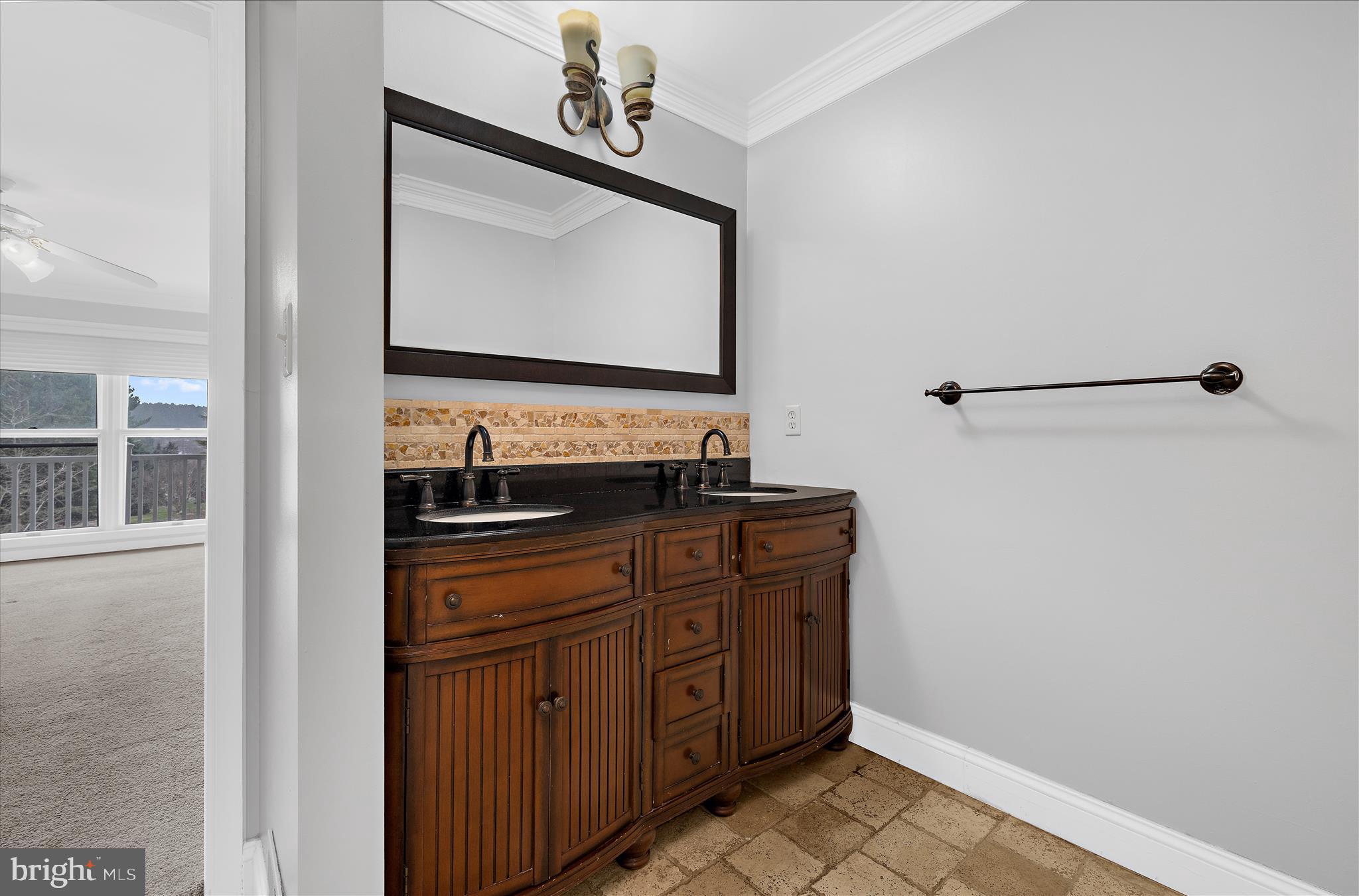 3300 Paper Mill Road Phoenix, MD 21131 - Photo 53 of 91 a bathroom with a sink a vanity and a mirror
