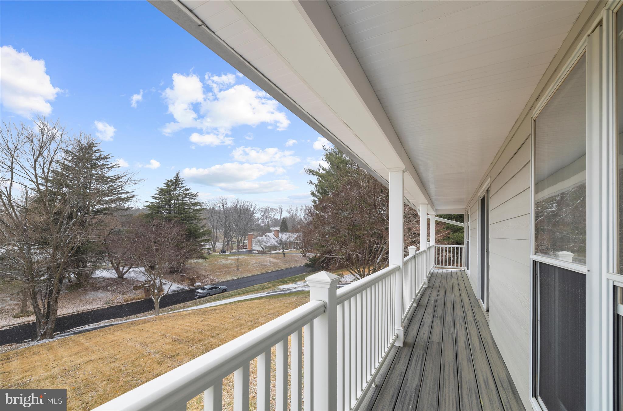 3300 Paper Mill Road Phoenix, MD 21131 - Photo 65 of 91 a view of a balcony with wooden floor and fence