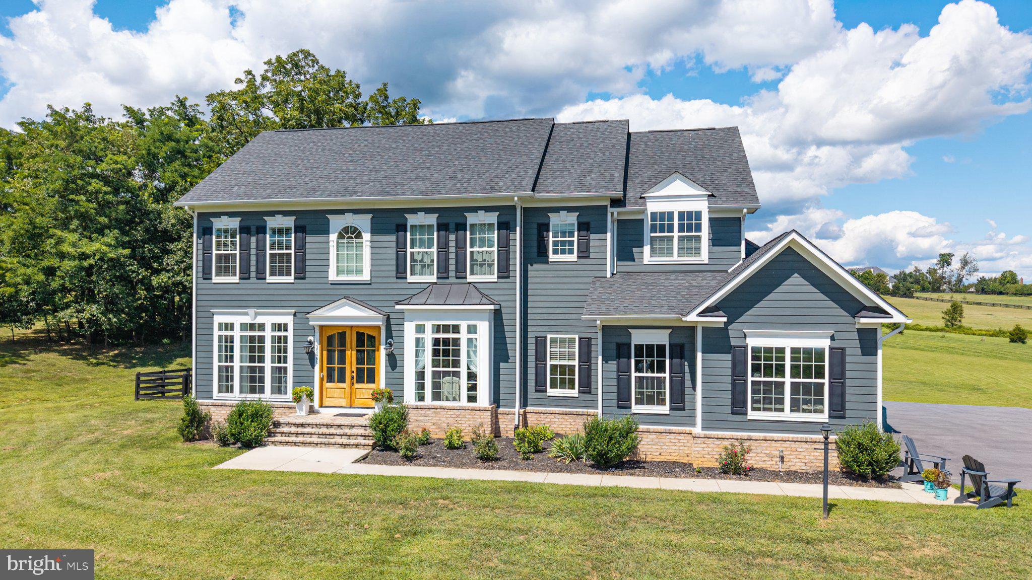 Charming home with scenic backdrop.