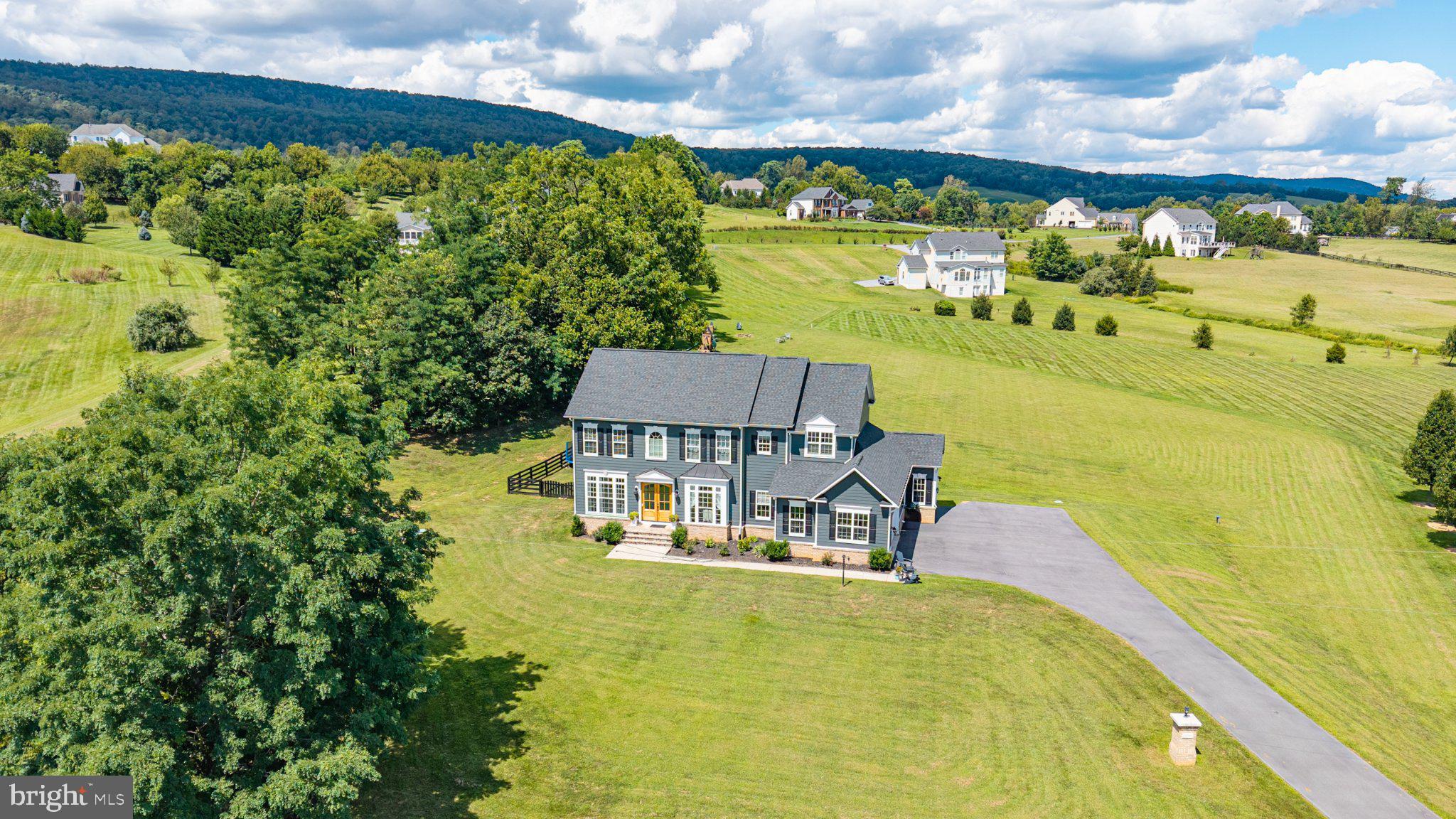 35490 Sunny Ridge Road Round Hill, VA 20141 - Photo 4 of 68 Spacious home amid scenic greenery.
