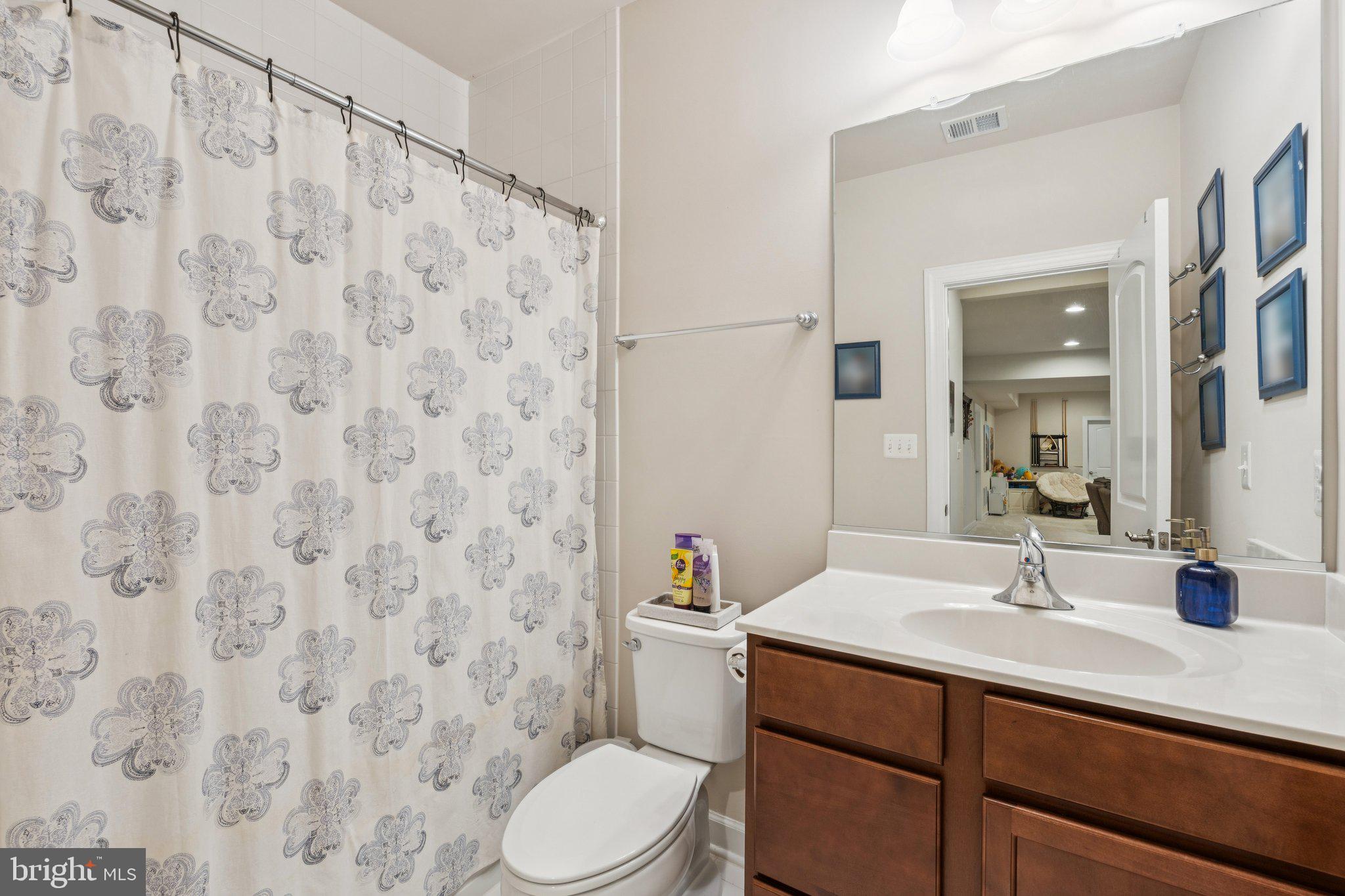 35490 Sunny Ridge Road Round Hill, VA 20141 - Photo 51 of 68 Charming bathroom with floral accents.