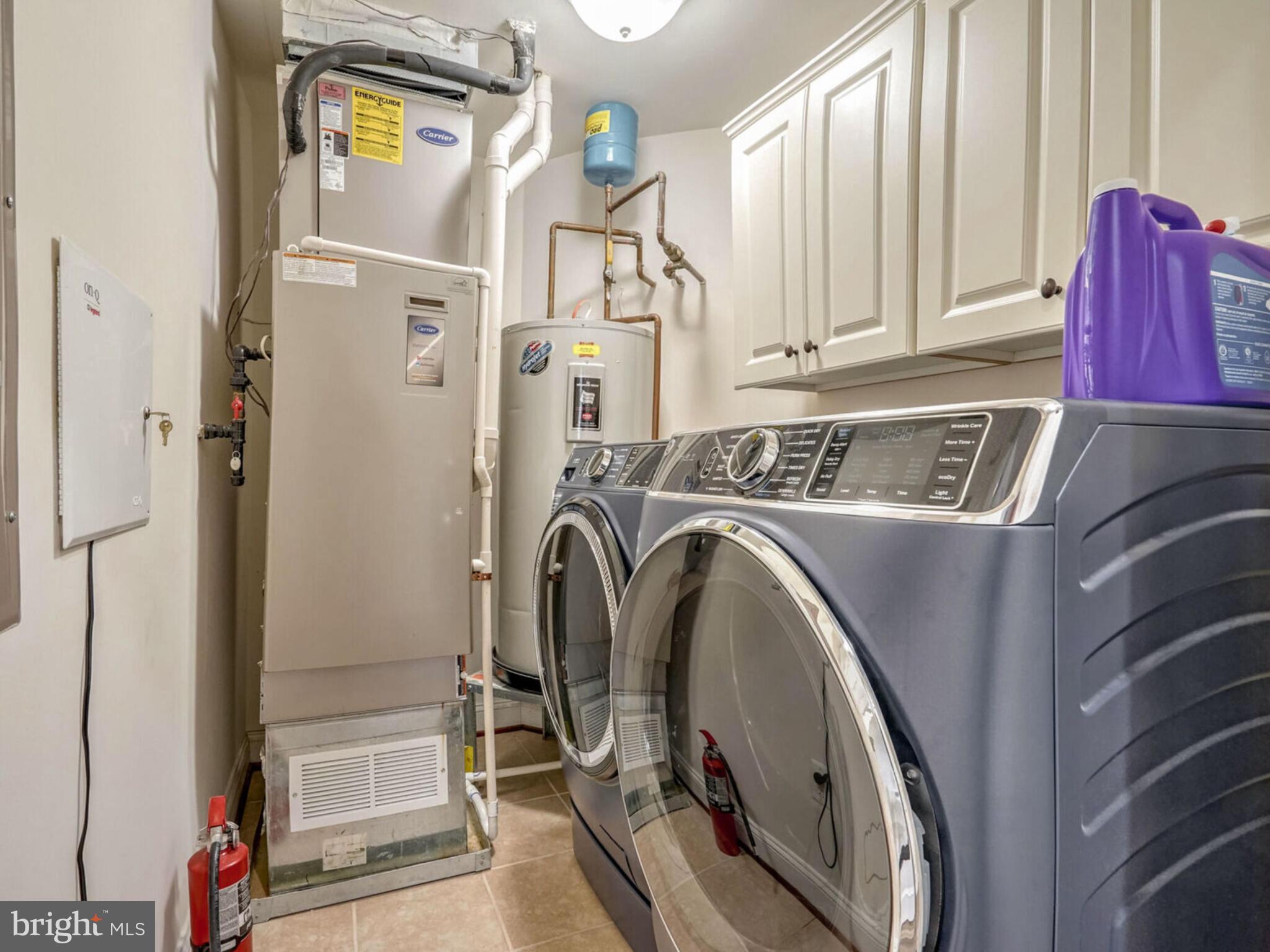 1781 Chain Bridge Road, Unit 307 McLean, VA 22102 - Photo 18 of 18 a utility room with dryer and washer