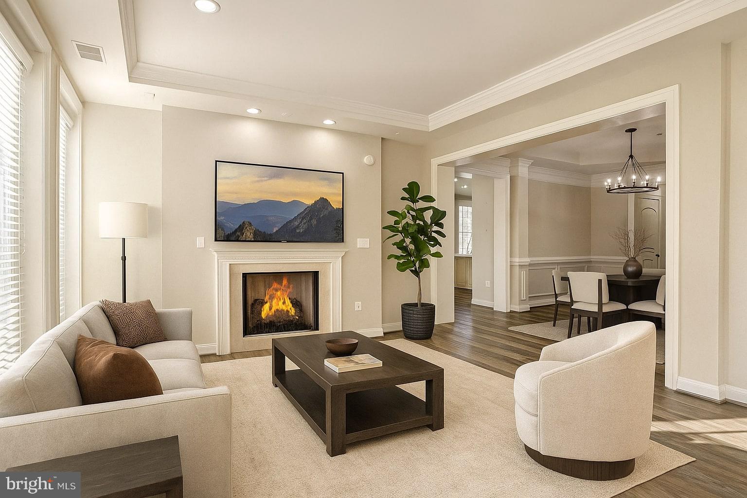 1781 Chain Bridge Road, Unit 307 McLean, VA 22102 - Photo 7 of 18 a living room with furniture and a fireplace