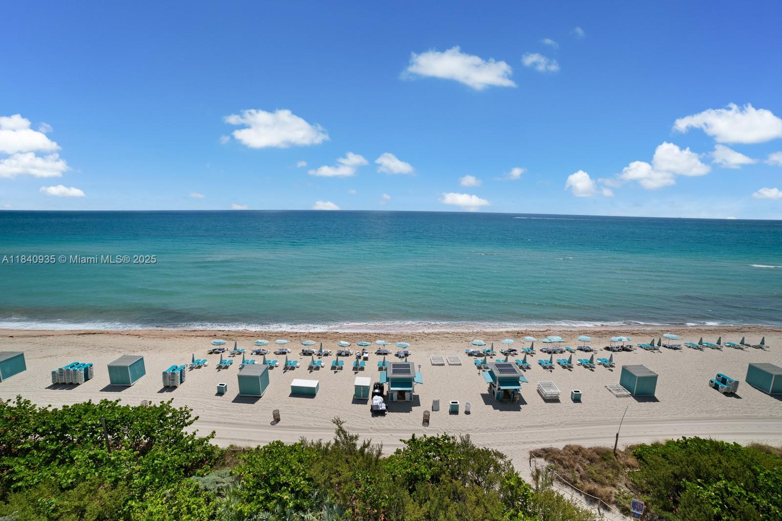 6801 Collins Avenue, Unit 705 Miami Beach, FL 33141 - Photo 1 of 54 a view of a water with an ocean