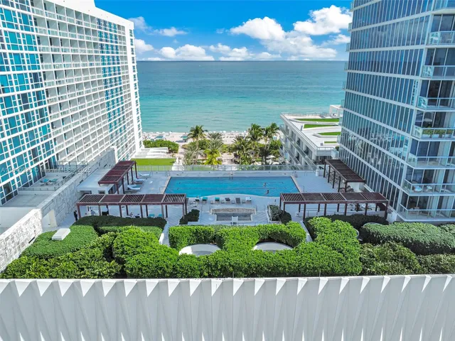 a view of a city with tall buildings