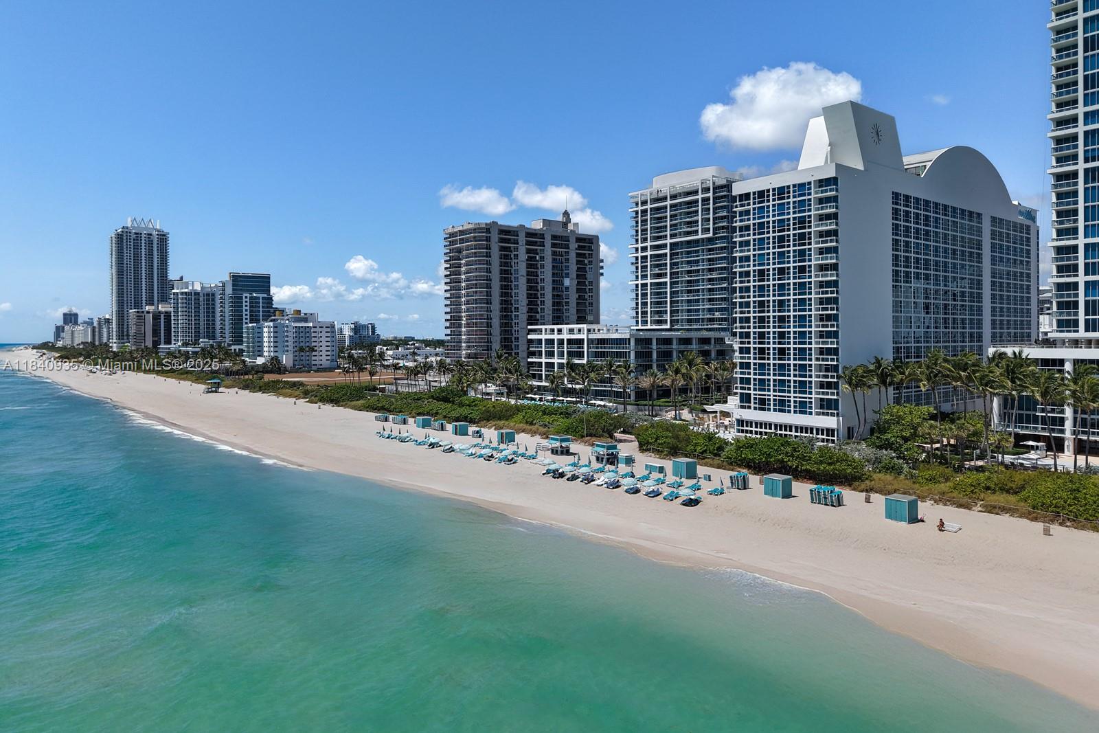 6801 Collins Avenue, Unit 705 Miami Beach, FL 33141 - Photo 42 of 54 a view of a city with tall buildings