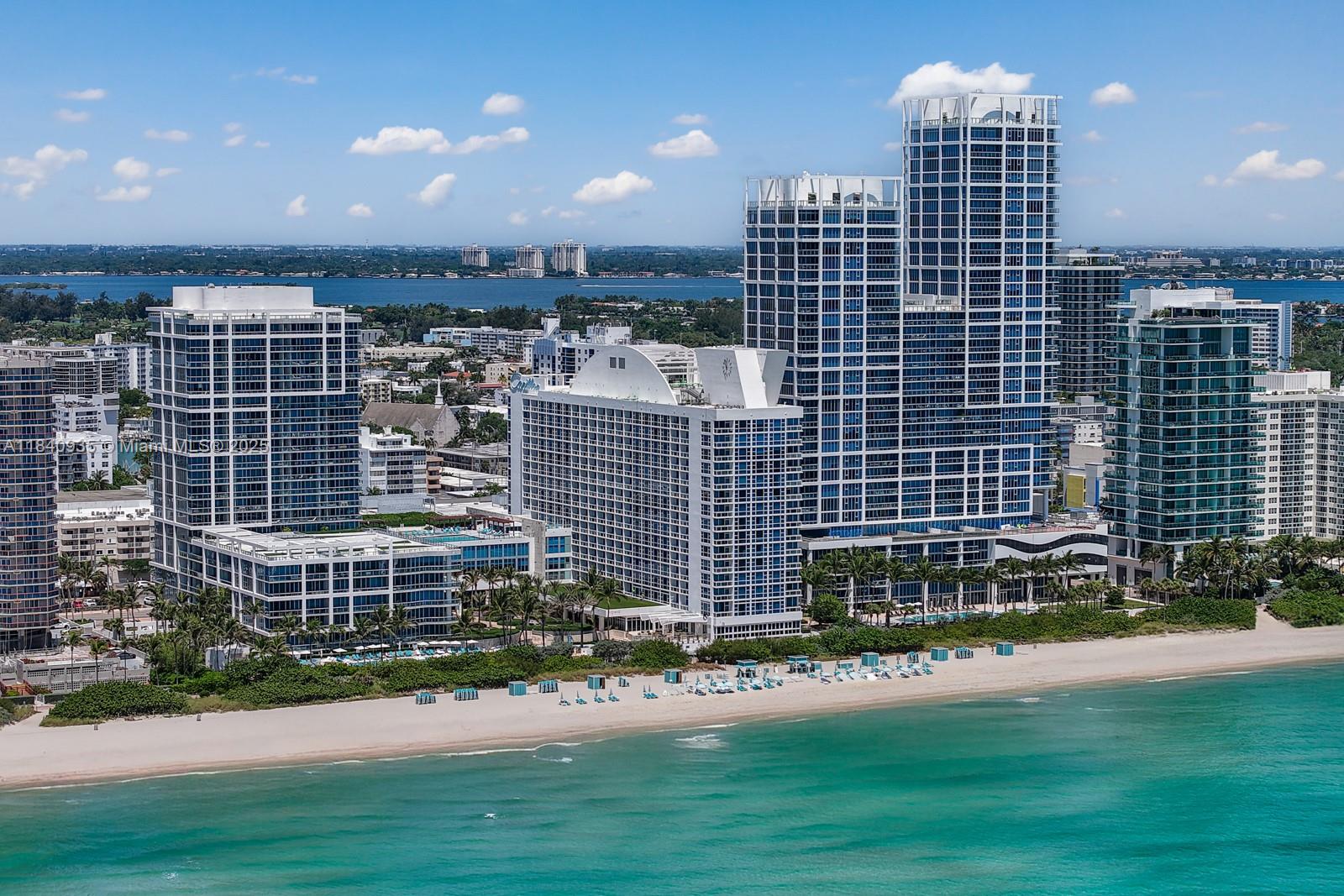 6801 Collins Avenue, Unit 705 Miami Beach, FL 33141 - Photo 44 of 54 a view of building with yard