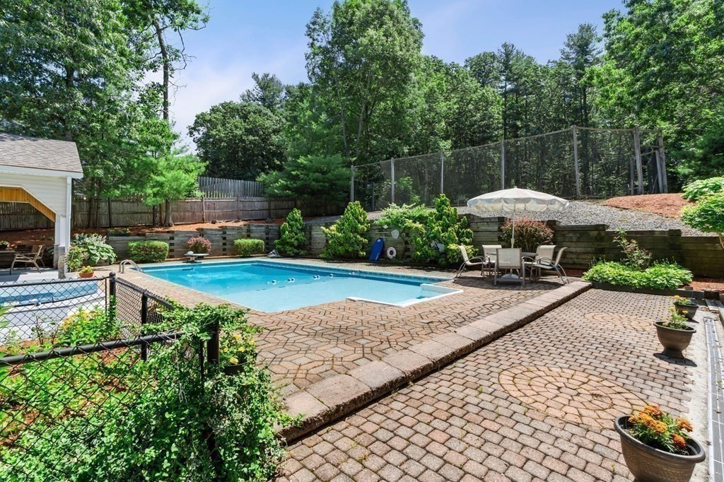 27 Rutgers Road Andover, MA 01810 - Photo 33 of 42 a view of a backyard with sitting area