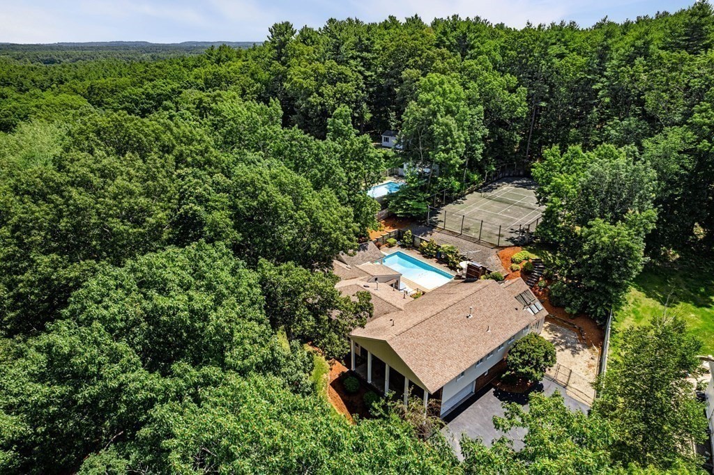 27 Rutgers Road Andover, MA 01810 - Photo 39 of 42 an aerial view of a house with yard and outdoor seating