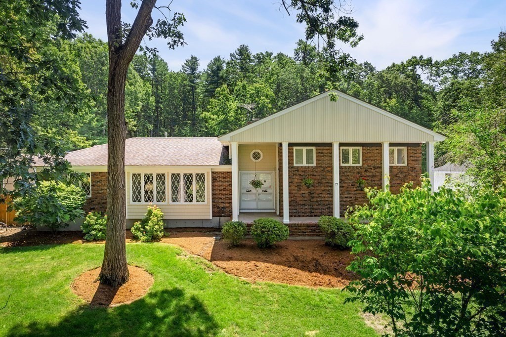 27 Rutgers Road Andover, MA 01810 - Photo 6 of 42 a front view of a house with a yard