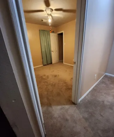 a kitchen with stainless steel appliances kitchen island granite countertop a stove top oven a sink dishwasher and a refrigerator