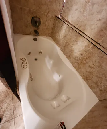 a bathroom with a bathtub