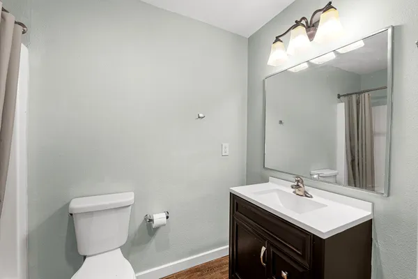 a bathroom with a sink and a toilet