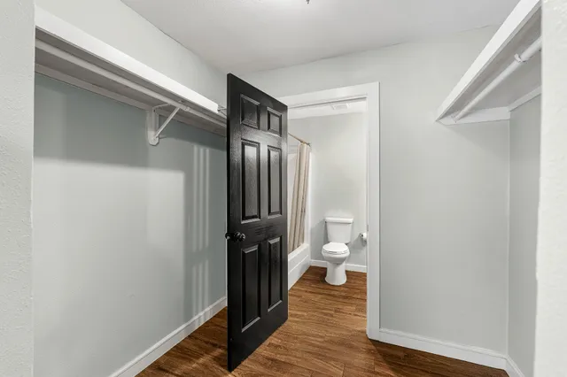 a view of a bathroom from the hallway