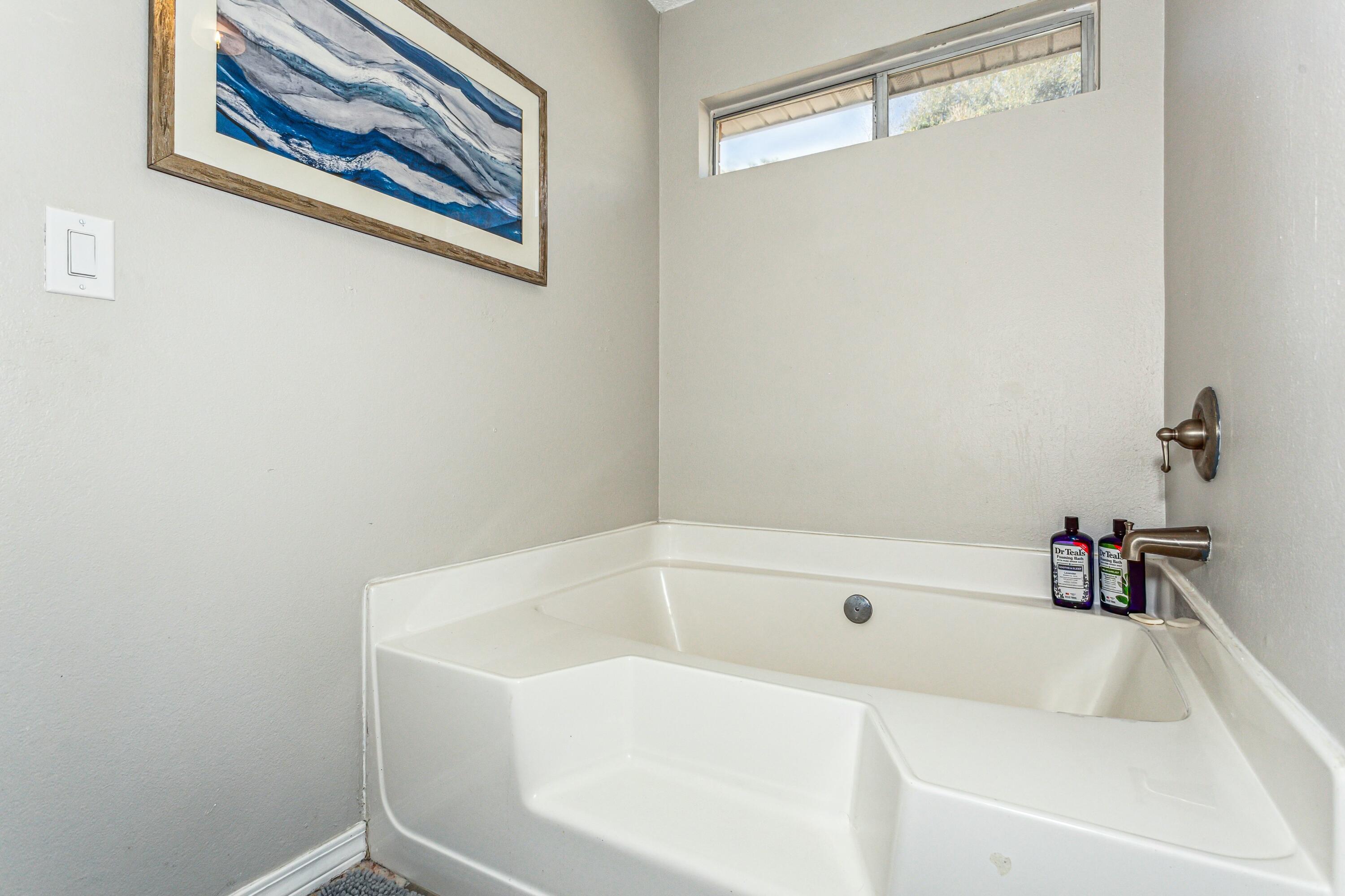 4741 Coronado Circle Crestview, FL 32539 - Photo 20 of 35 a bathroom with a bathtub