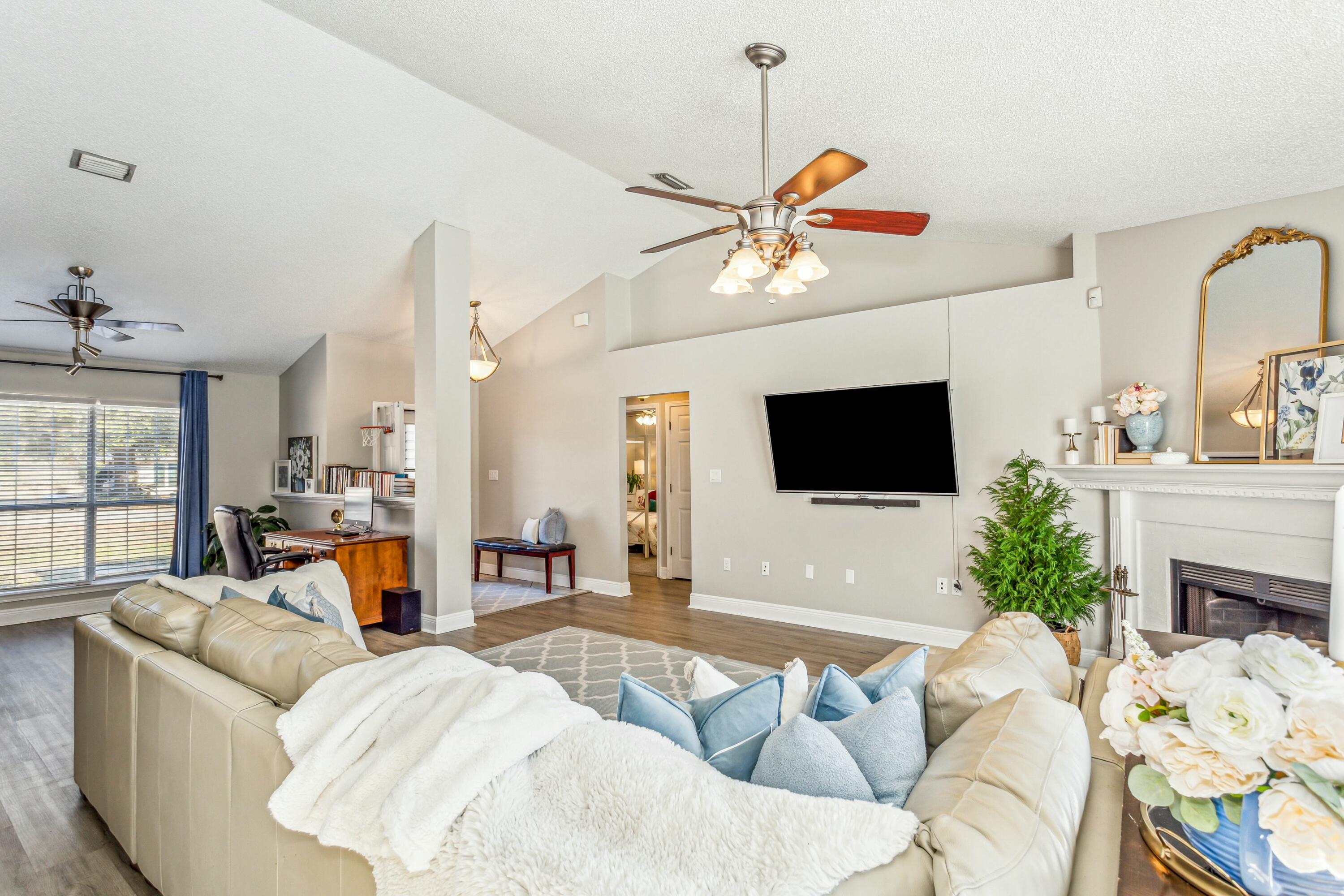 4741 Coronado Circle Crestview, FL 32539 - Photo 5 of 35 a living room with furniture and a flat screen tv