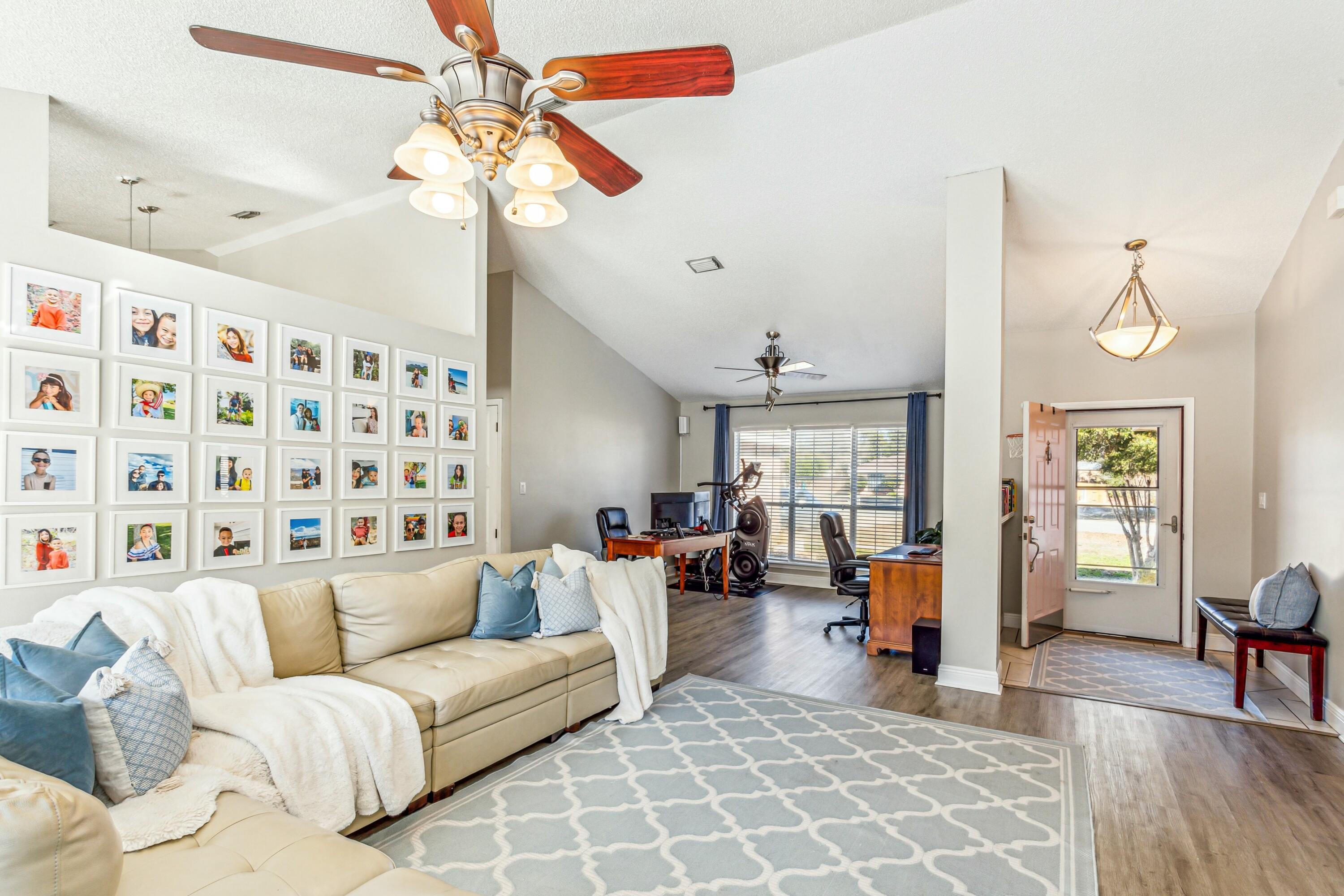 4741 Coronado Circle Crestview, FL 32539 - Photo 7 of 35 a living room with furniture and a large window