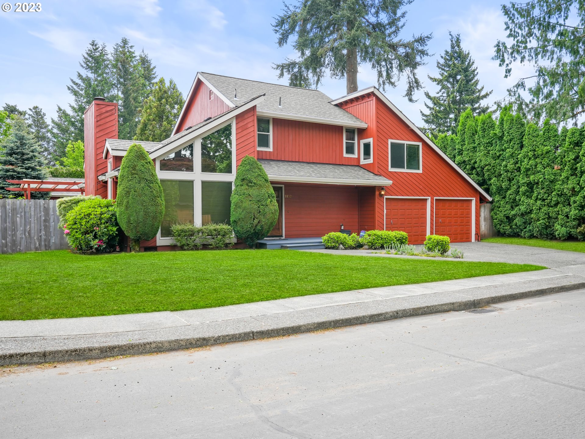 18320 Ross Avenue Sandy, OR 97055 - Photo 1 of 48 a front view of house with yard and green space