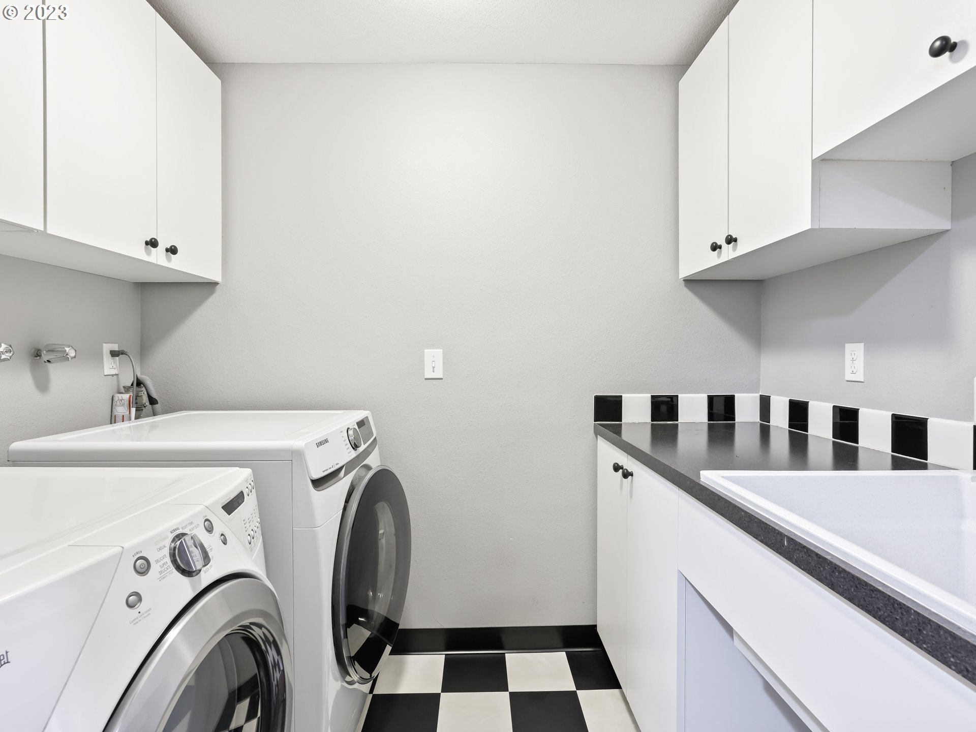 18320 Ross Avenue Sandy, OR 97055 - Photo 12 of 48 a utility room with dryer and washer