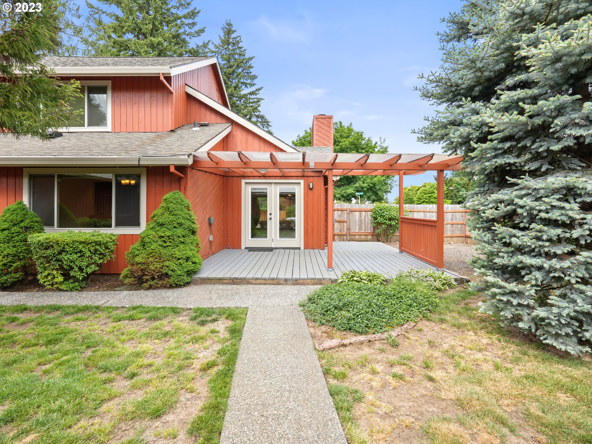 18320 Ross Avenue Sandy, OR 97055 - Photo 33 of 48 a front view of a house with a yard and trees