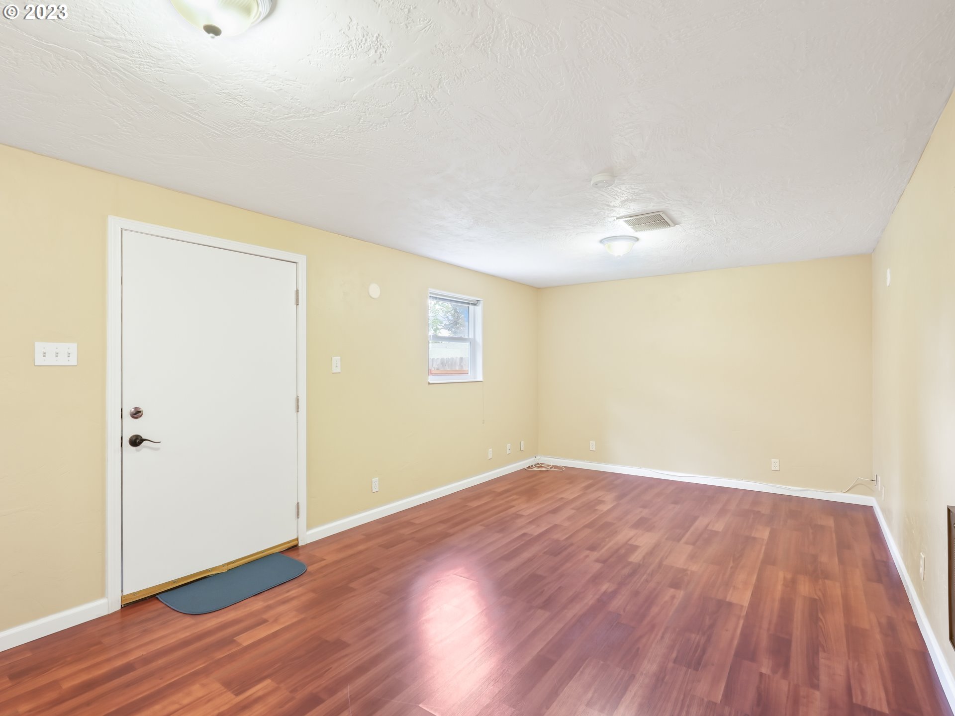 18320 Ross Avenue Sandy, OR 97055 - Photo 36 of 48 an empty room with wooden floor