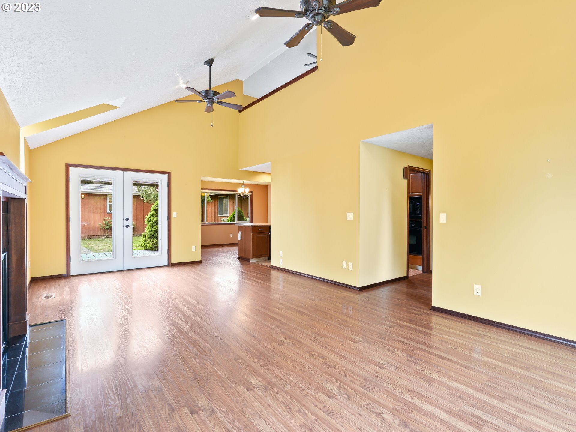 18320 Ross Avenue Sandy, OR 97055 - Photo 4 of 48 a view of empty room with wooden floor and fan