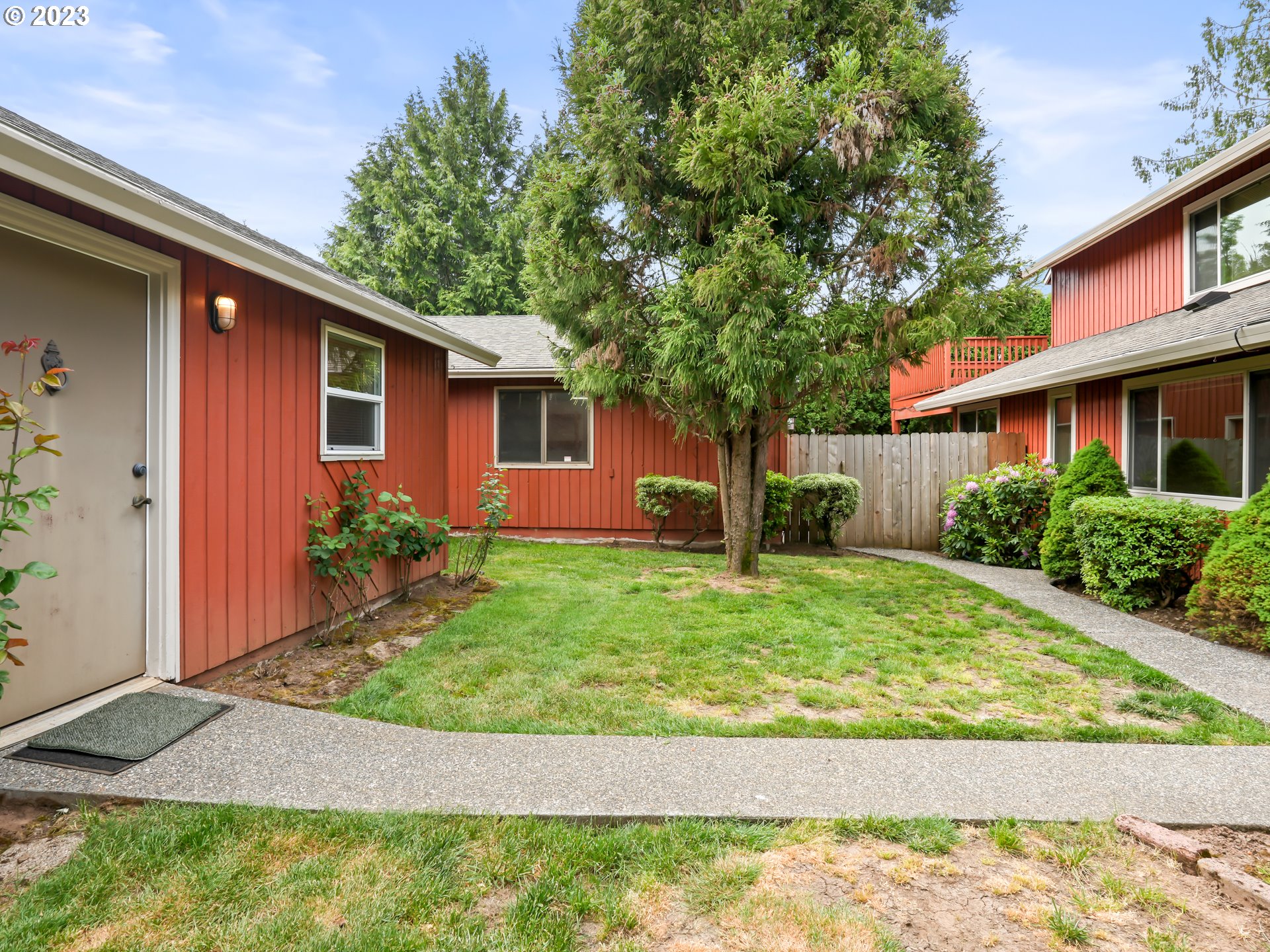 18320 Ross Avenue Sandy, OR 97055 - Photo 45 of 48 a front view of a house with garden