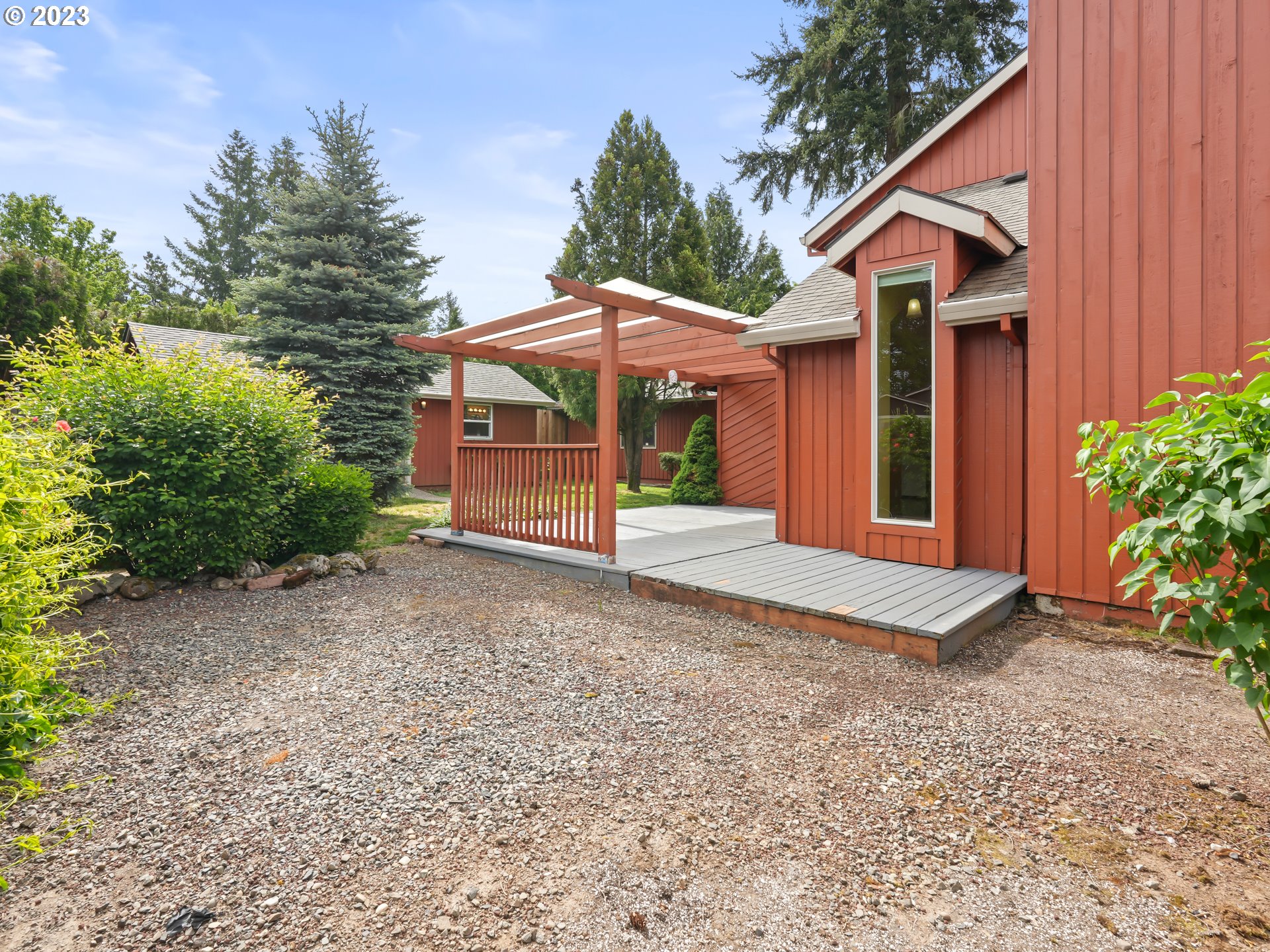 18320 Ross Avenue Sandy, OR 97055 - Photo 48 of 48 a view of a house with backyard and trees