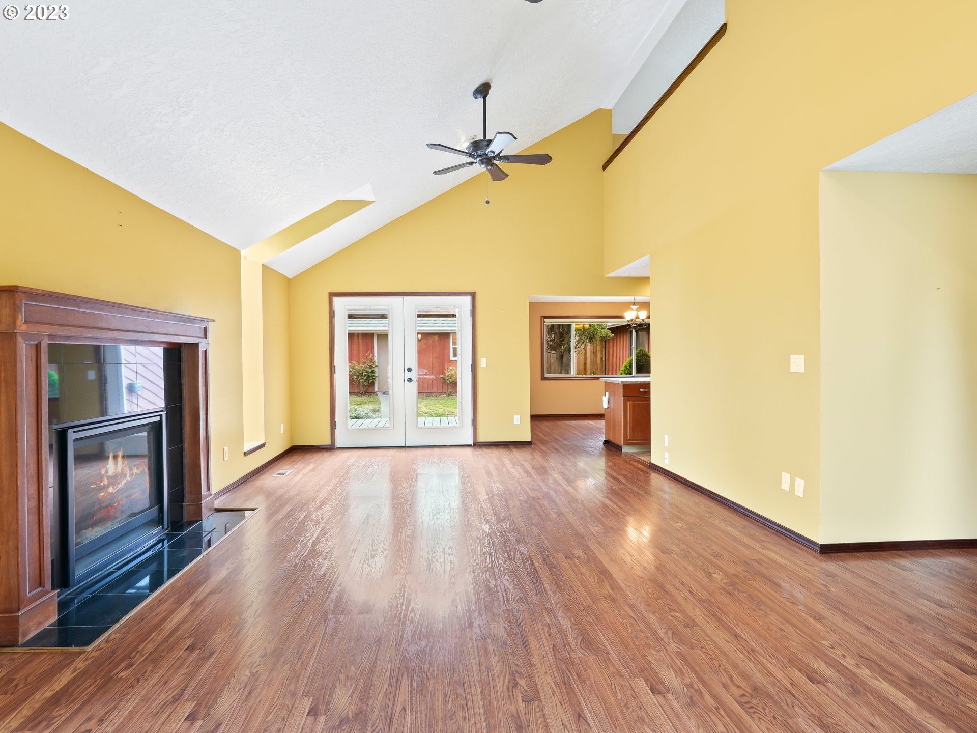 18320 Ross Avenue Sandy, OR 97055 - Photo 5 of 48 a view of an empty room with wooden floor and a window