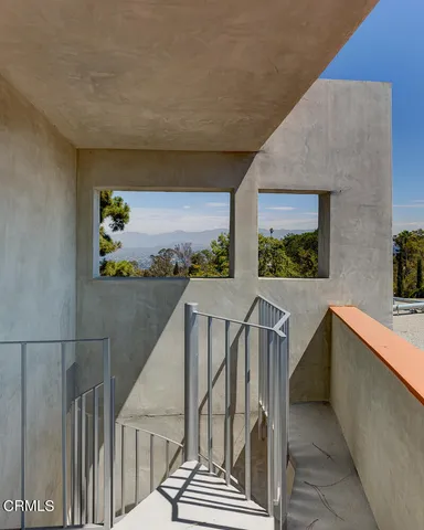 a view of balcony and furniture