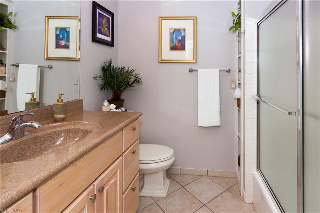 5411 Rambling Road Greensboro, NC 27409 - Photo 22 of 30 Upstairs hall bath.
