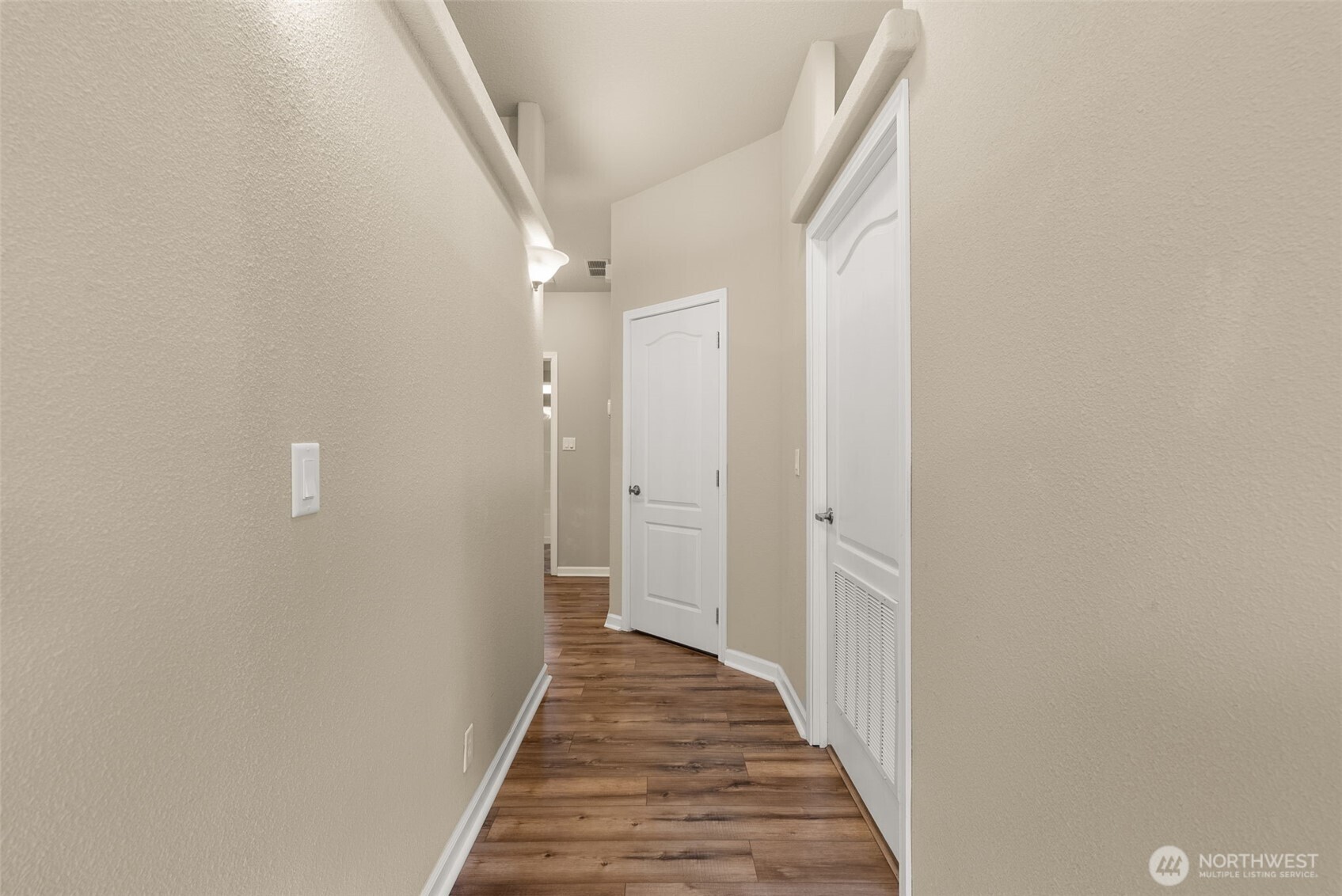 4259 Lakeview Lane Southeast, Unit 63 Lacey, WA 98503 - Photo 18 of 29 a view of a hallway with wooden floor