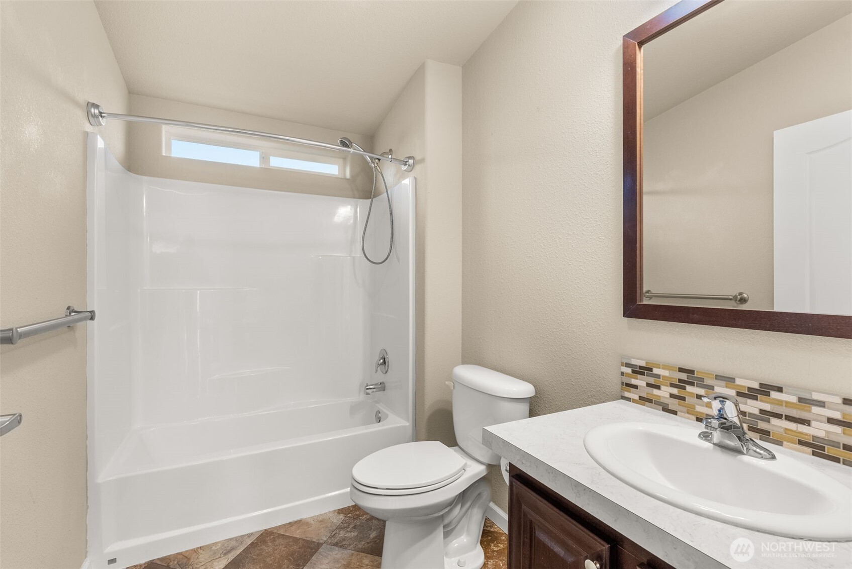 4259 Lakeview Lane Southeast, Unit 63 Lacey, WA 98503 - Photo 20 of 29 a bathroom with a sink toilet and shower