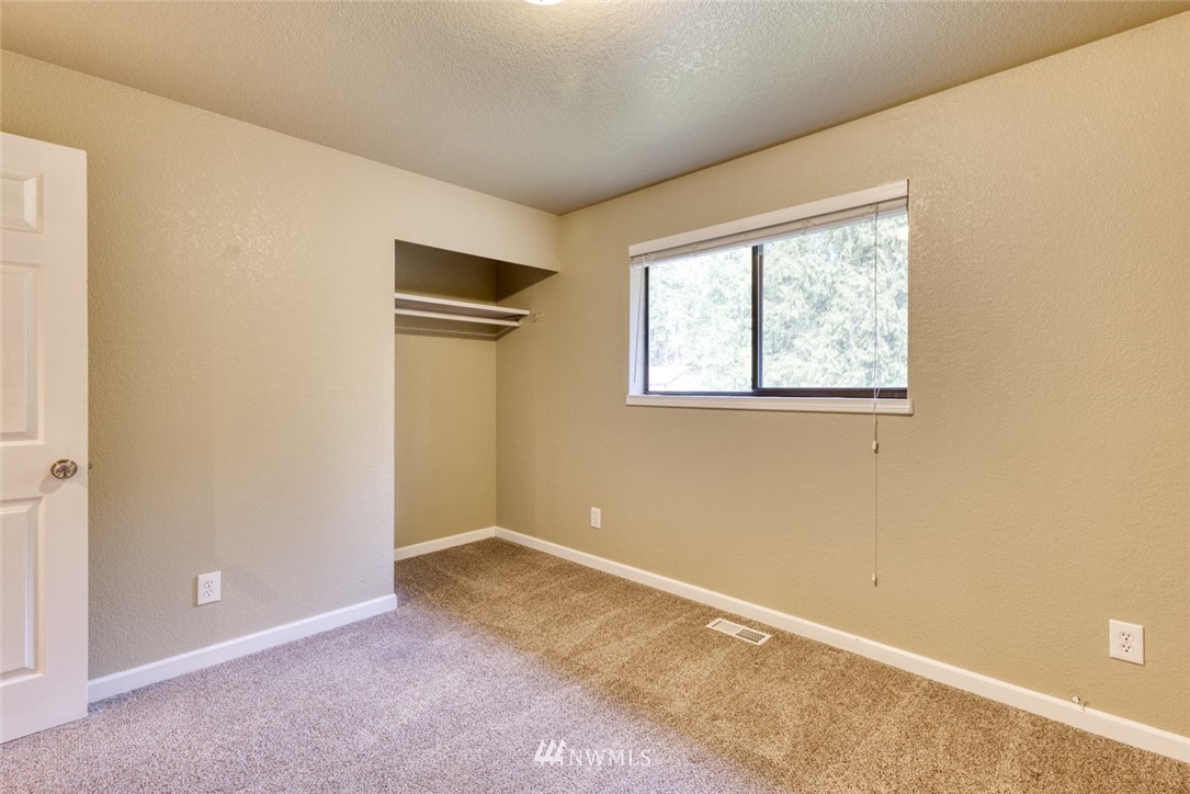 17517 48th Street East Lake Tapps, WA 98391 - Photo 19 of 36 an empty room with windows