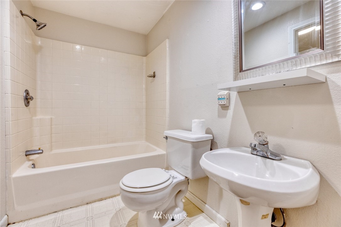 17517 48th Street East Lake Tapps, WA 98391 - Photo 25 of 36 a bathroom with a sink toilet and shower