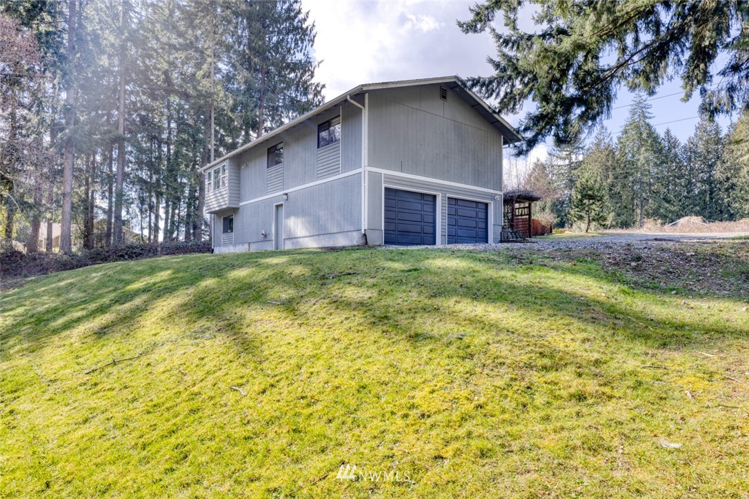 17517 48th Street East Lake Tapps, WA 98391 - Photo 28 of 36 a view of a house with a yard