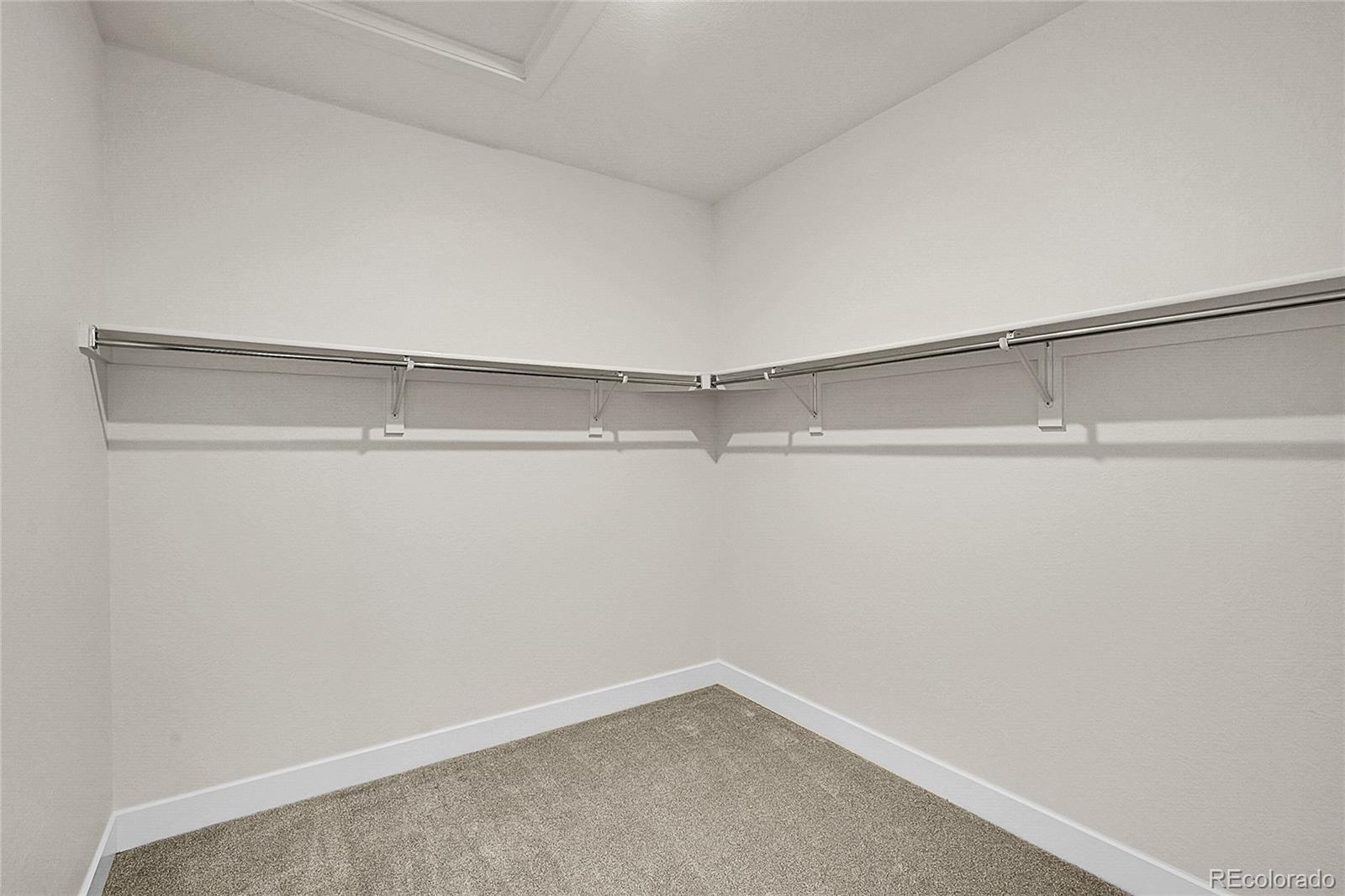 8530 West 52nd Avenue, Unit E3 Arvada, CO 80002 - Photo 15 of 27 a view of a room with racks on the wall