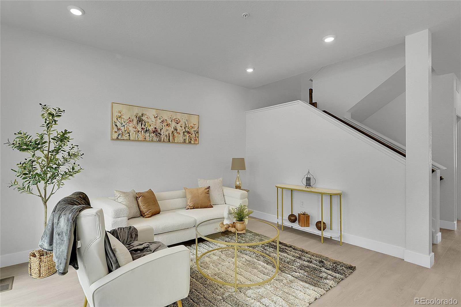 8530 West 52nd Avenue, Unit E3 Arvada, CO 80002 - Photo 18 of 27 a living room with furniture
