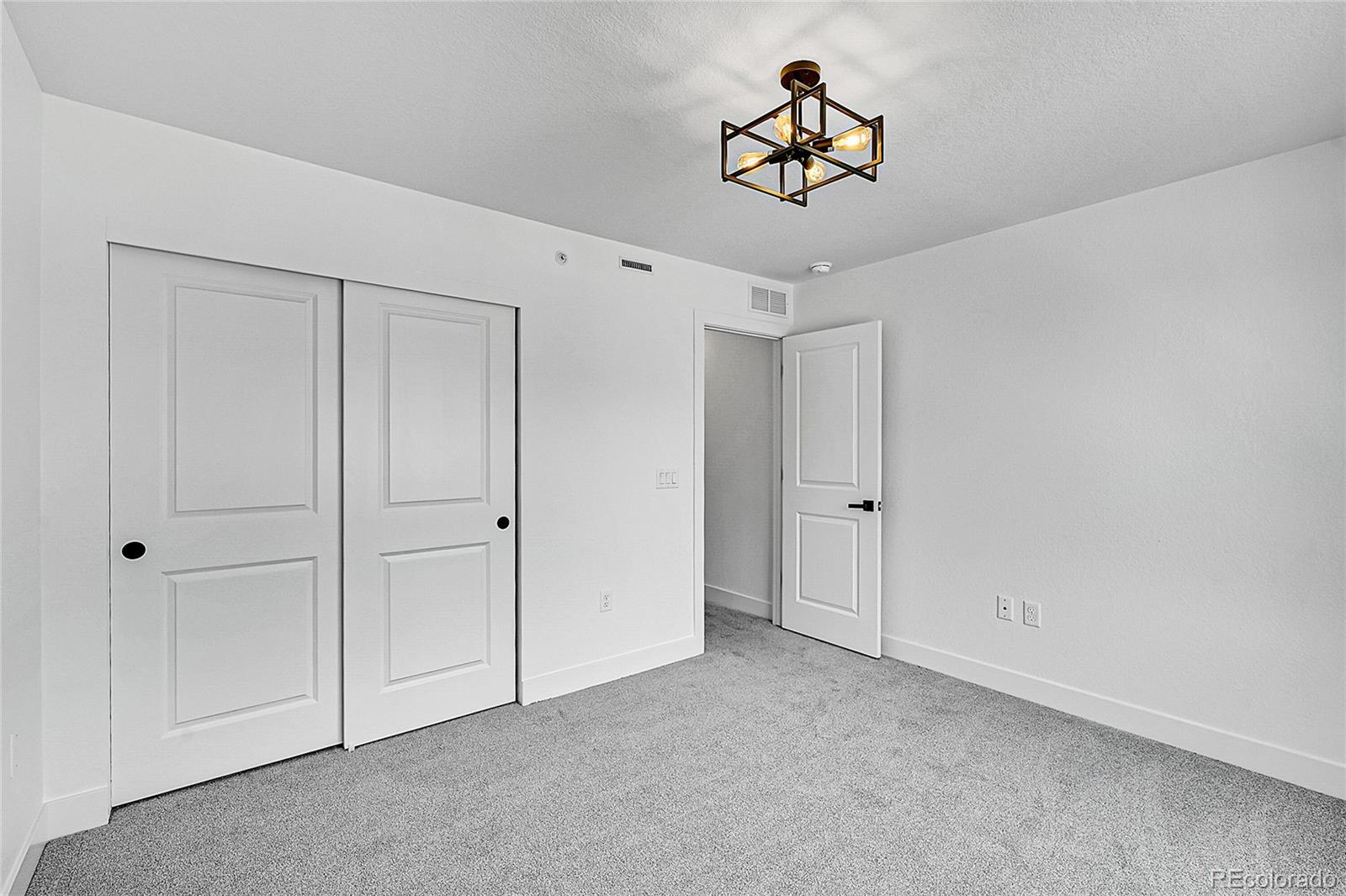 8530 West 52nd Avenue, Unit E3 Arvada, CO 80002 - Photo 26 of 27 a view of an empty room