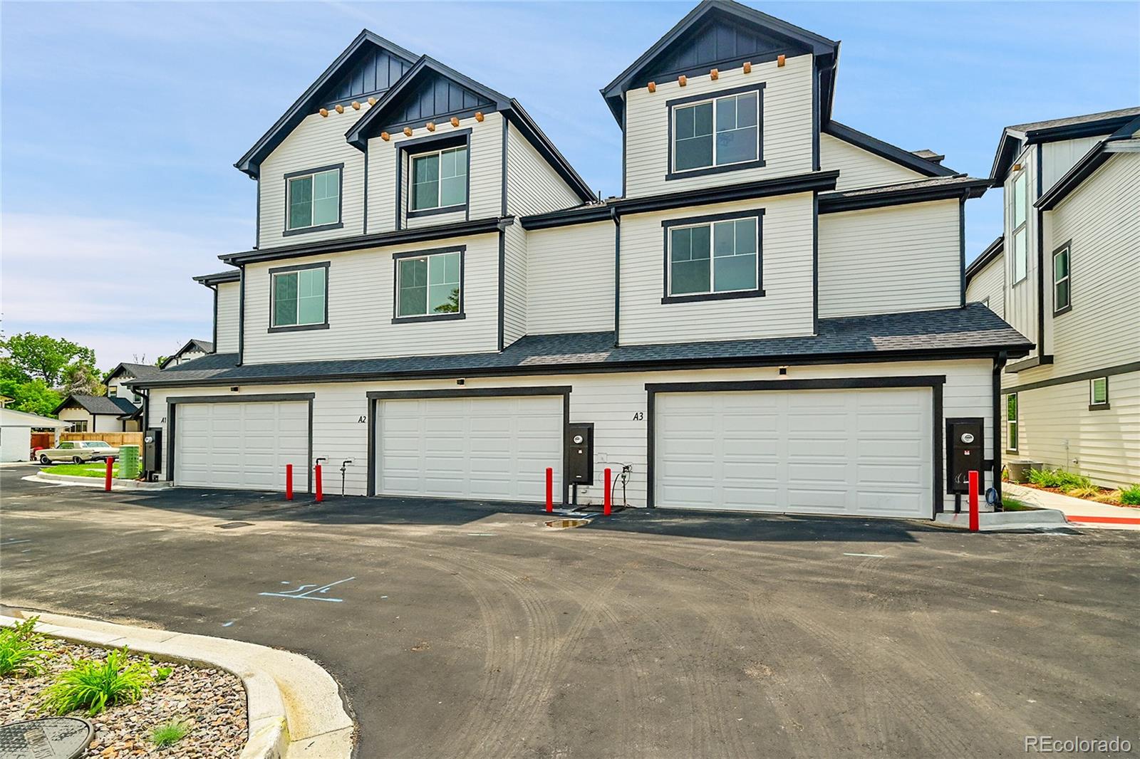 8530 West 52nd Avenue, Unit E3 Arvada, CO 80002 - Photo 27 of 27 a front view of a house with a road