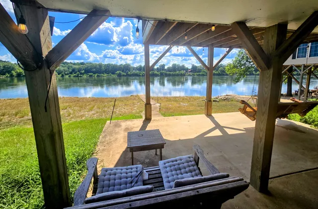 a view of swimming pool with a patio